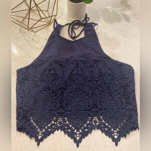 Garage crop halter tank size medium with tie at neck and lace detail